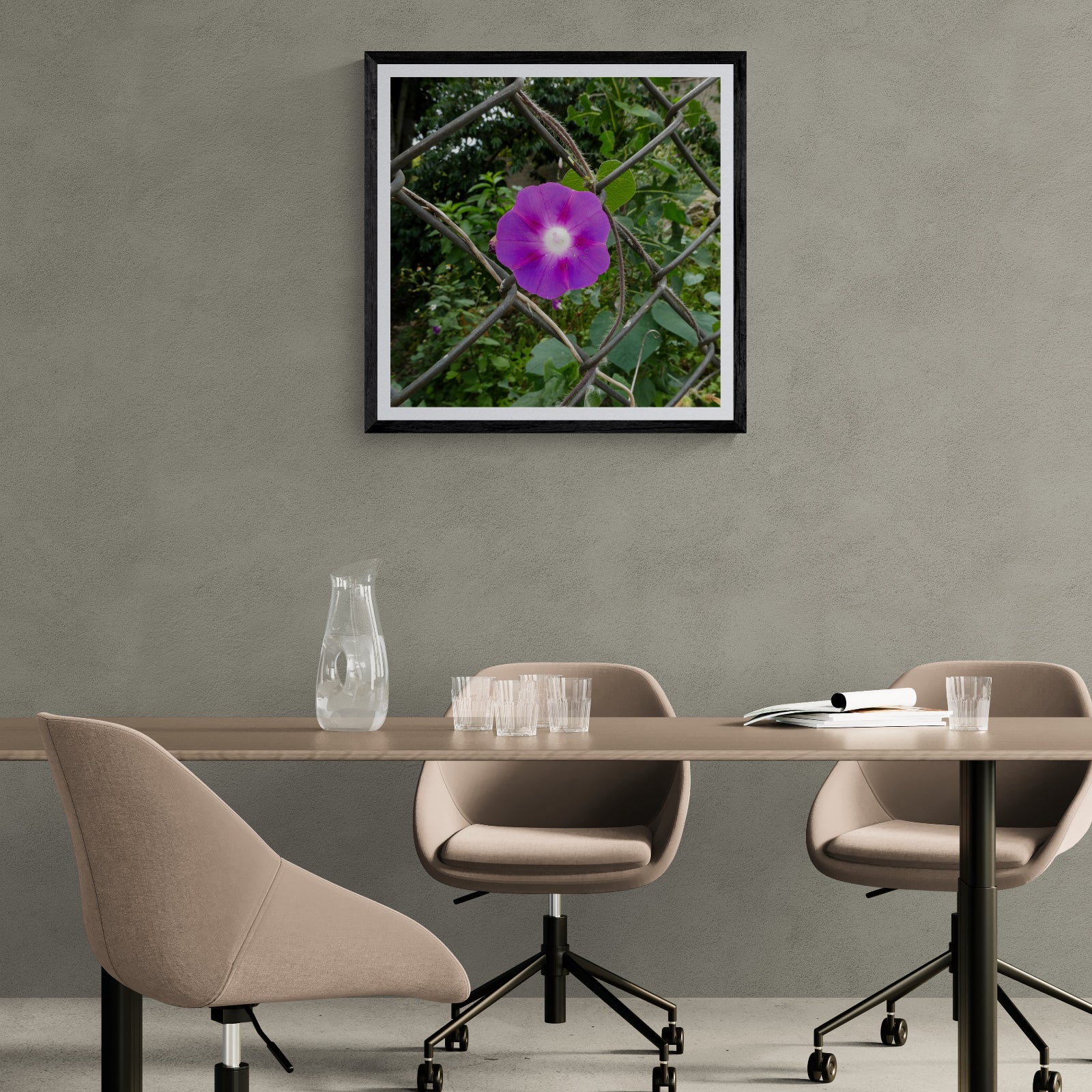 Day Shift purple morning glory photography art print displayed as 30 × 30 wall art in a black frame above a modern office table.