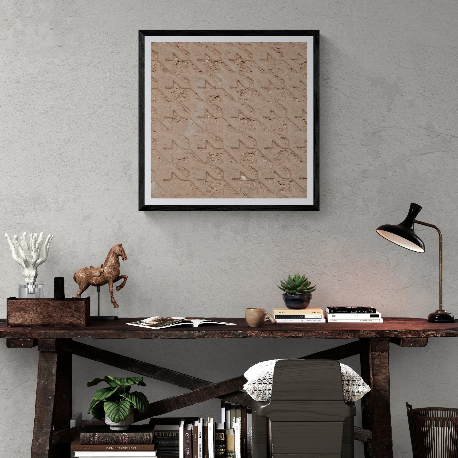Earth Archive earth-impressed houndstooth photography art print displayed as 30 × 30 wall art in a black frame above a rustic wood desk.