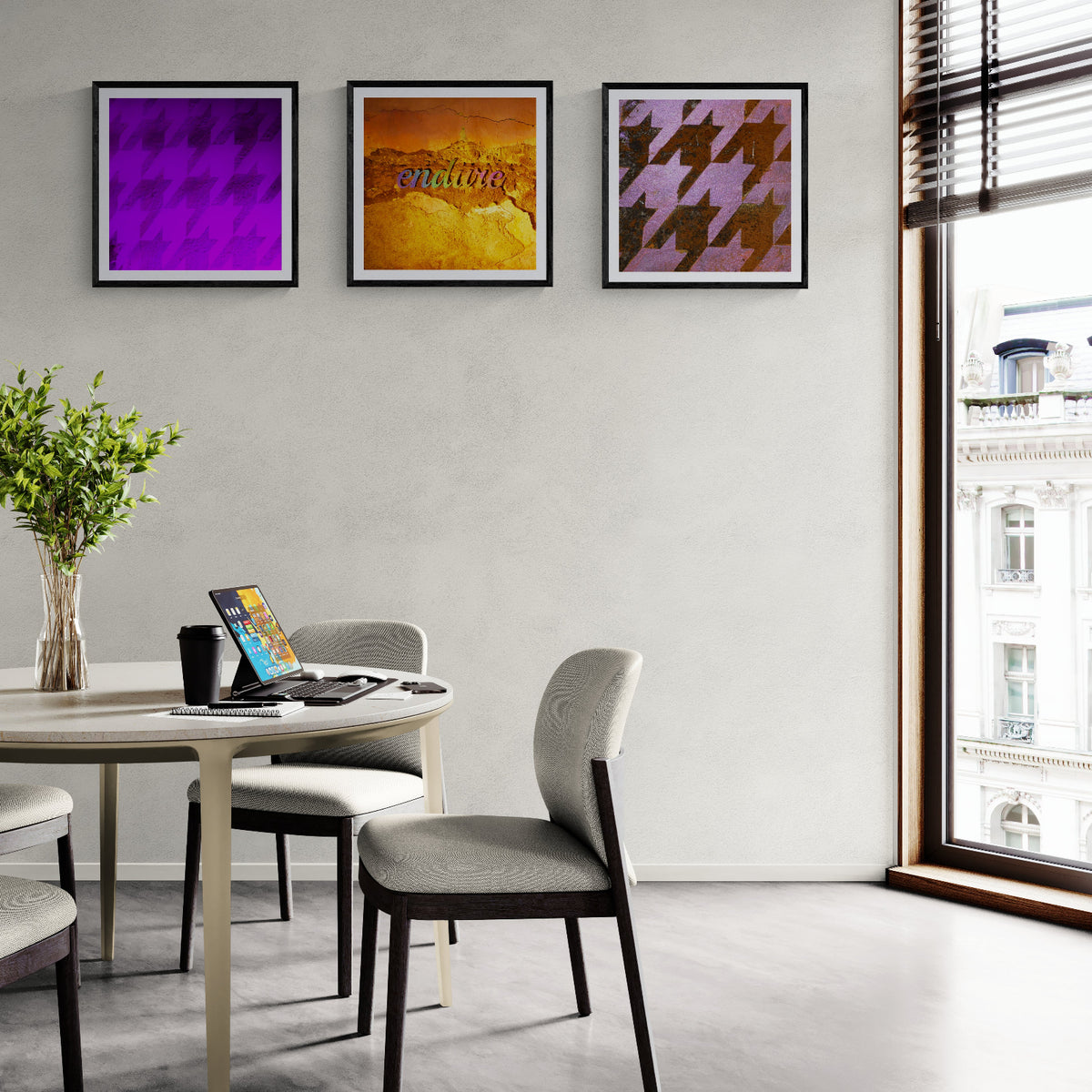 Three square framed art prints in a modern dining room featuring purple houndstooth patterns and an amber textured “endure” typography print.