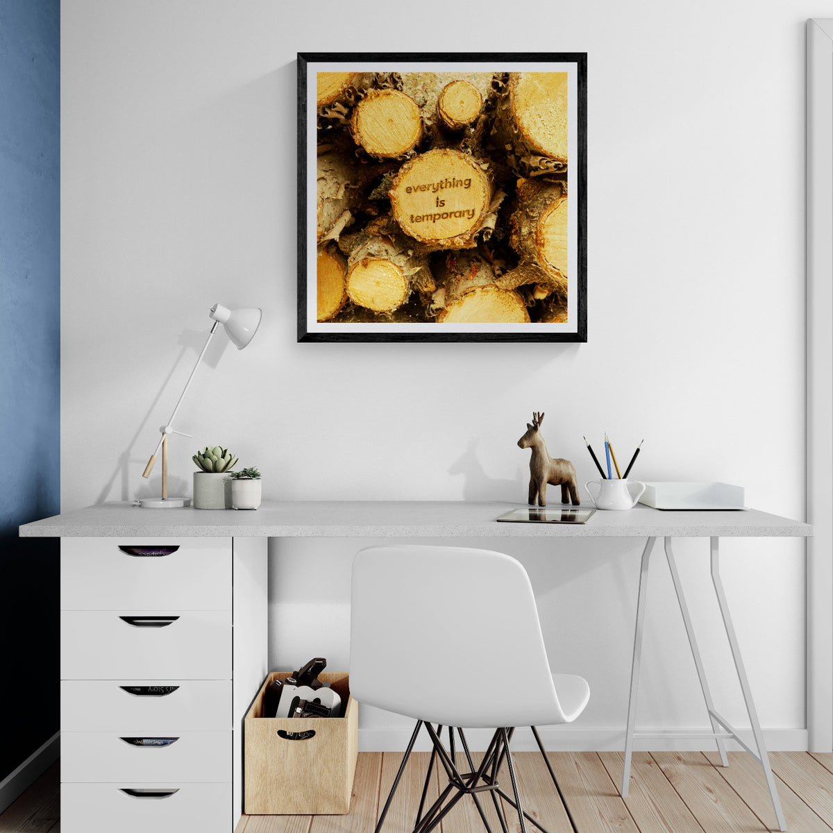 Everything Is Temporary typography art print featuring cut wood displayed as 30 × 30 wall art in a black frame above a white desk in a minimalist home office.