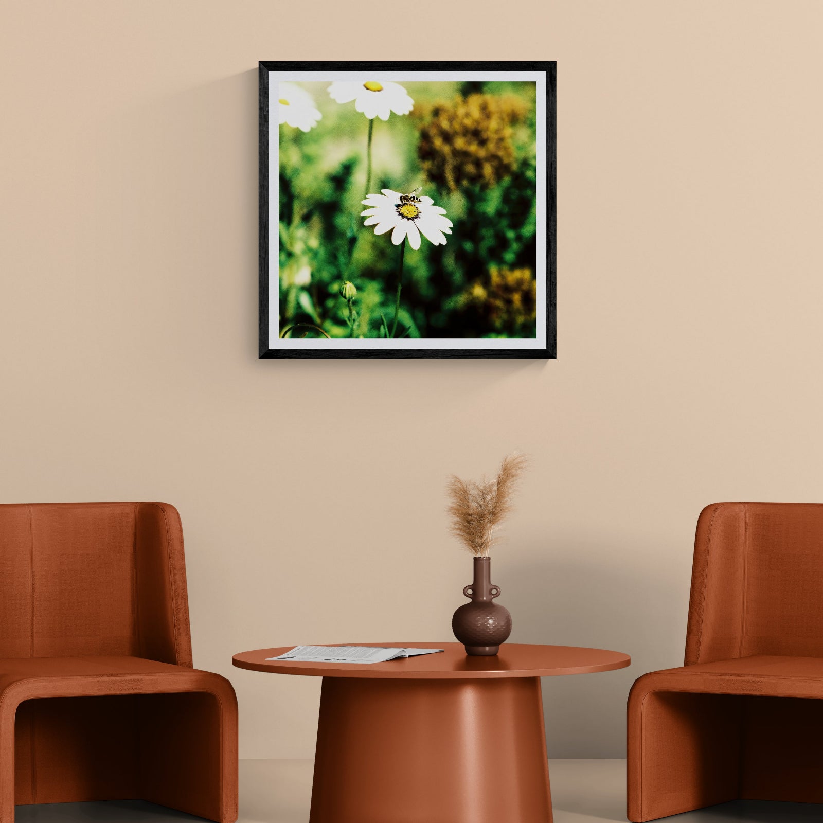 Golden Landing grainy film photograph of a bee resting on a white daisy surrounded by green foliage, displayed as 30 × 30 wall art in a black frame.