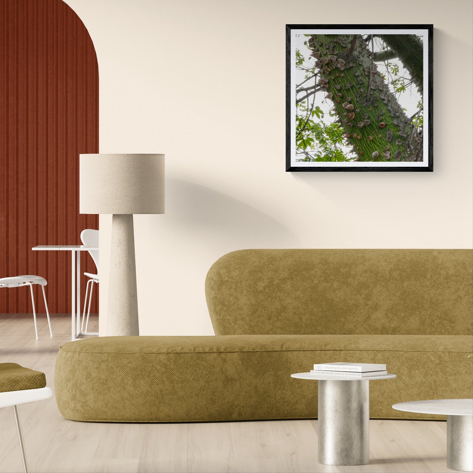 Hug a Tree pochote tree photography art print displayed as 30 × 30 wall art in a black frame above a green sofa in a modern living room.