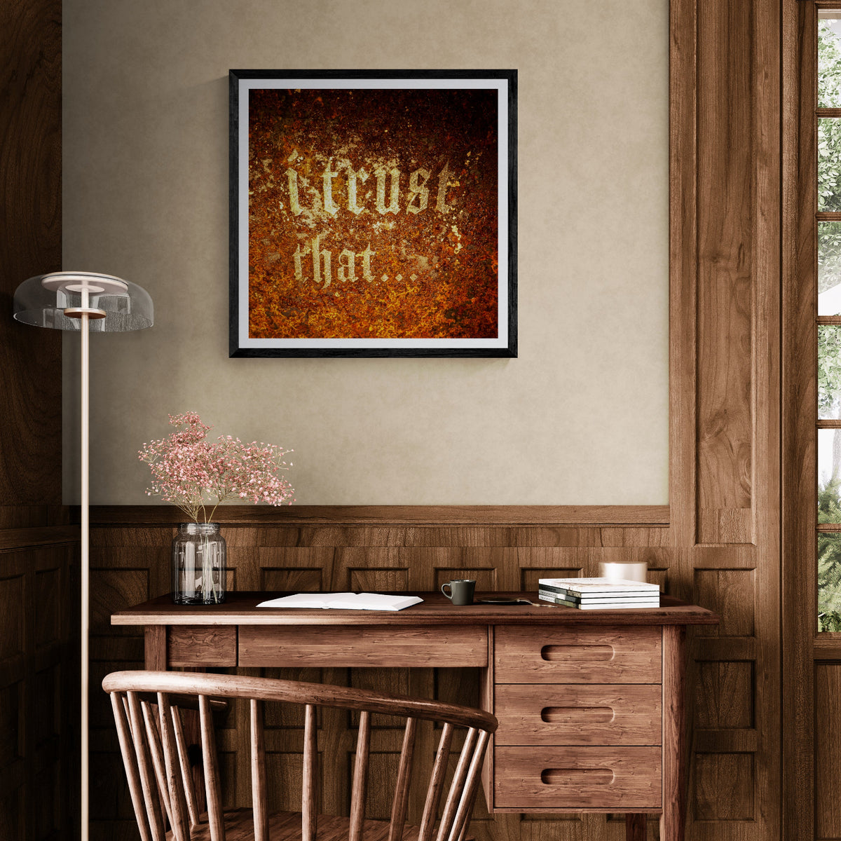 I Trust That... distressed typography art print on a rusted surface displayed as 30 × 30 wall art in a black frame above a wood desk in a traditional home office.