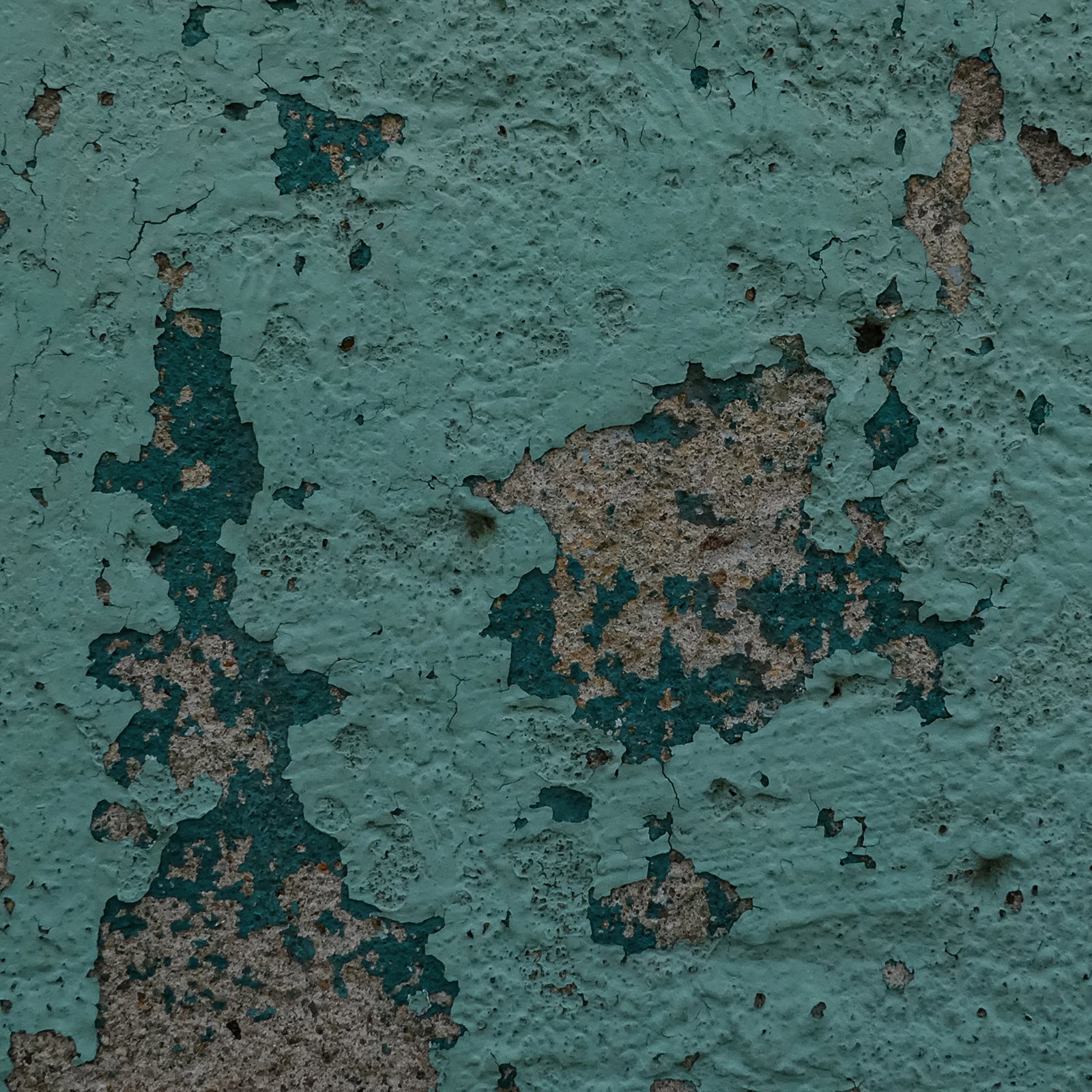 Close-up photograph of peeling mint green paint revealing darker green layers and rough concrete beneath in a square abstract art print.