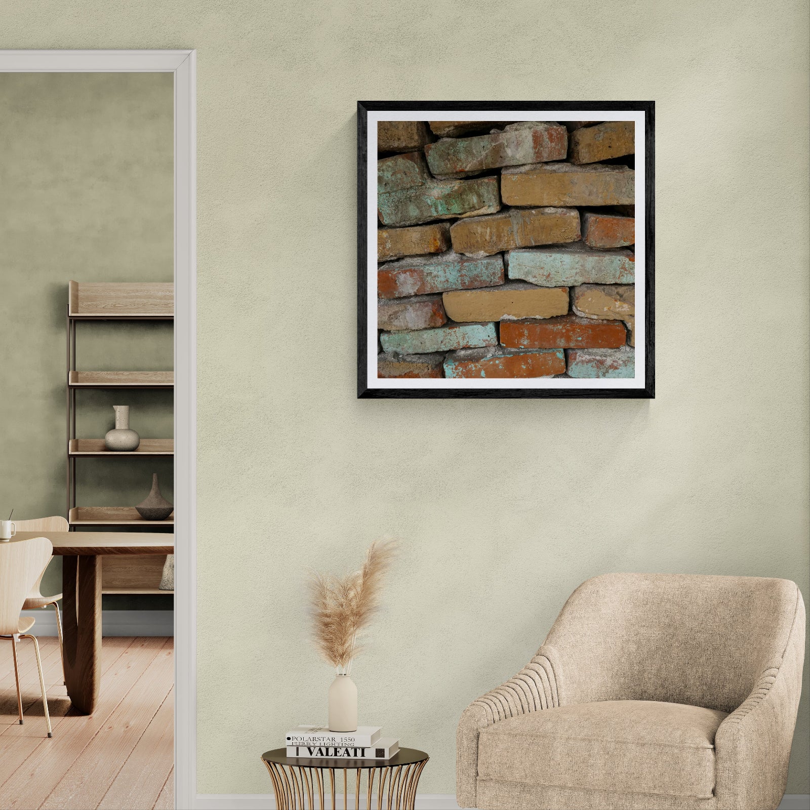 Pastel Tense weathered brick photography art print displayed as 30 × 30 wall art in a black frame in a neutral modern living room.